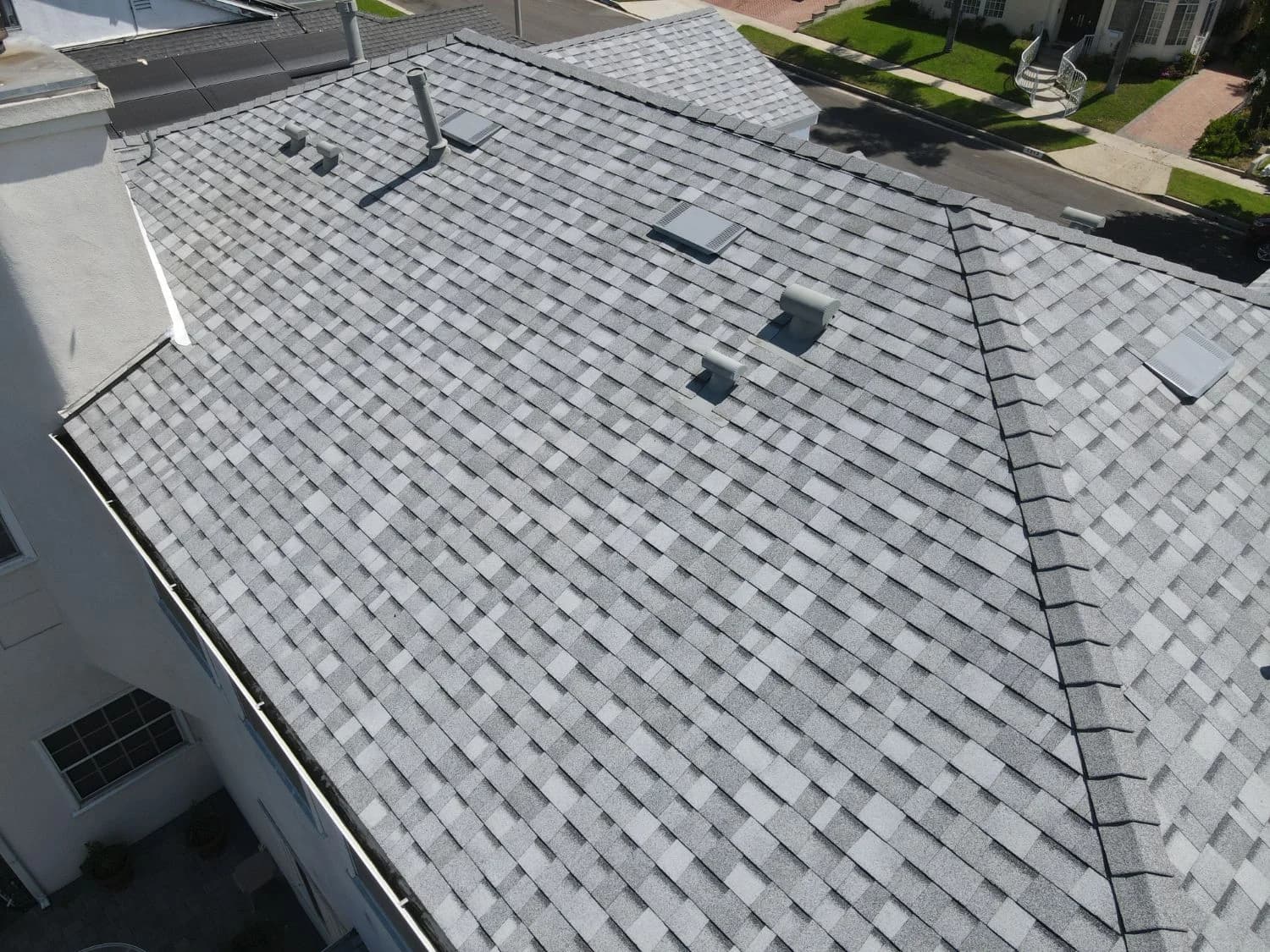 Close aerial view of a dimensional shingle roof on a Southern California home