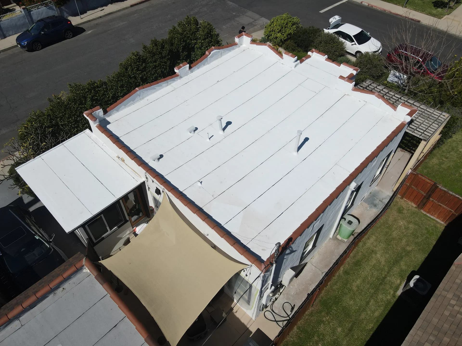 Aerial view of a flat roof surface used for commercial roof maintenance