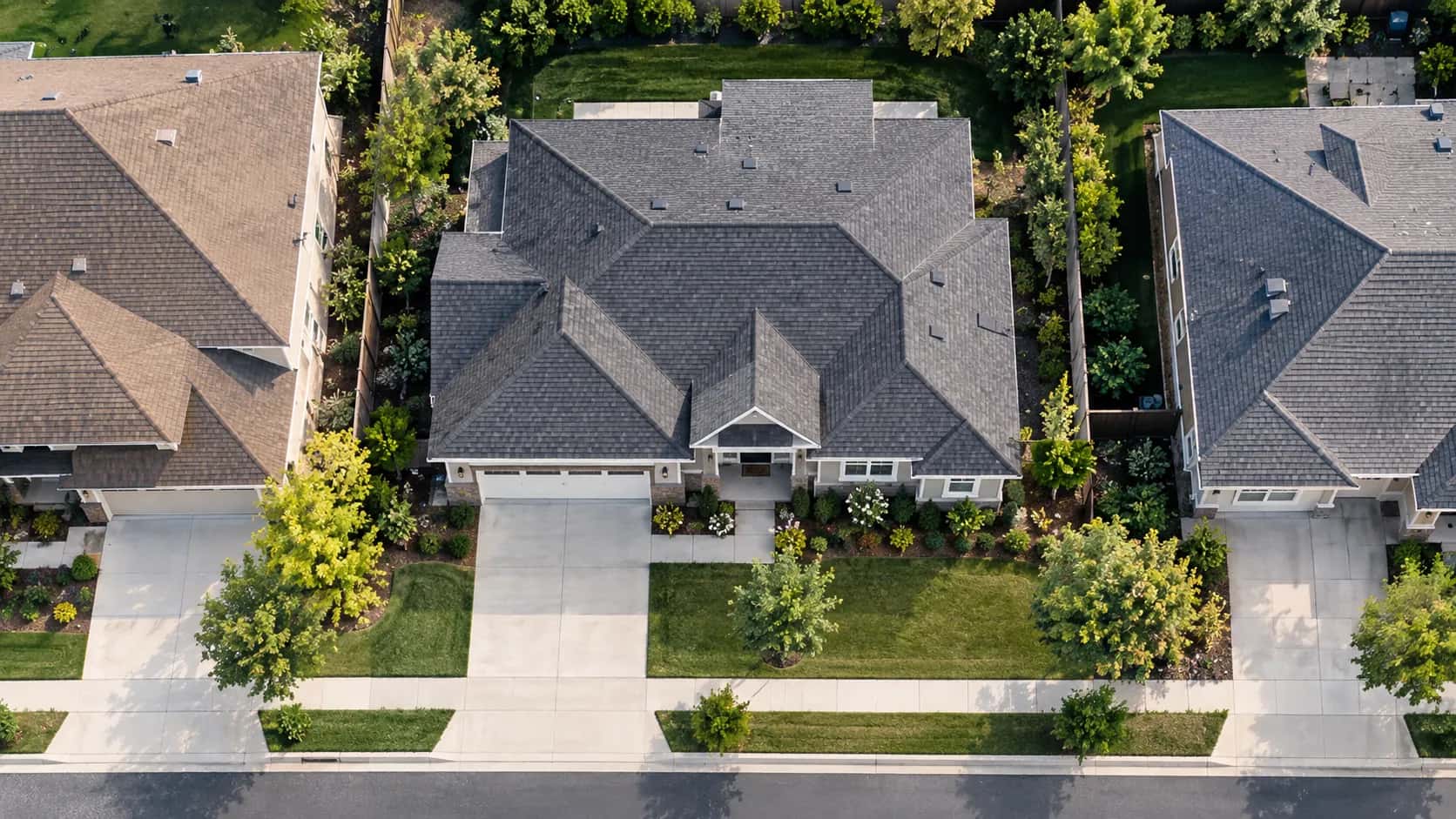 Aerial view of a Southern California neighborhood of shingle-roofed homes