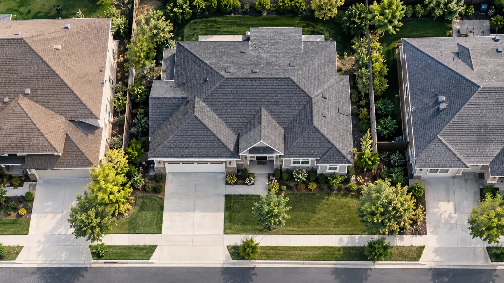 Aerial view of finished shingle roofs in a Southern California neighborhood