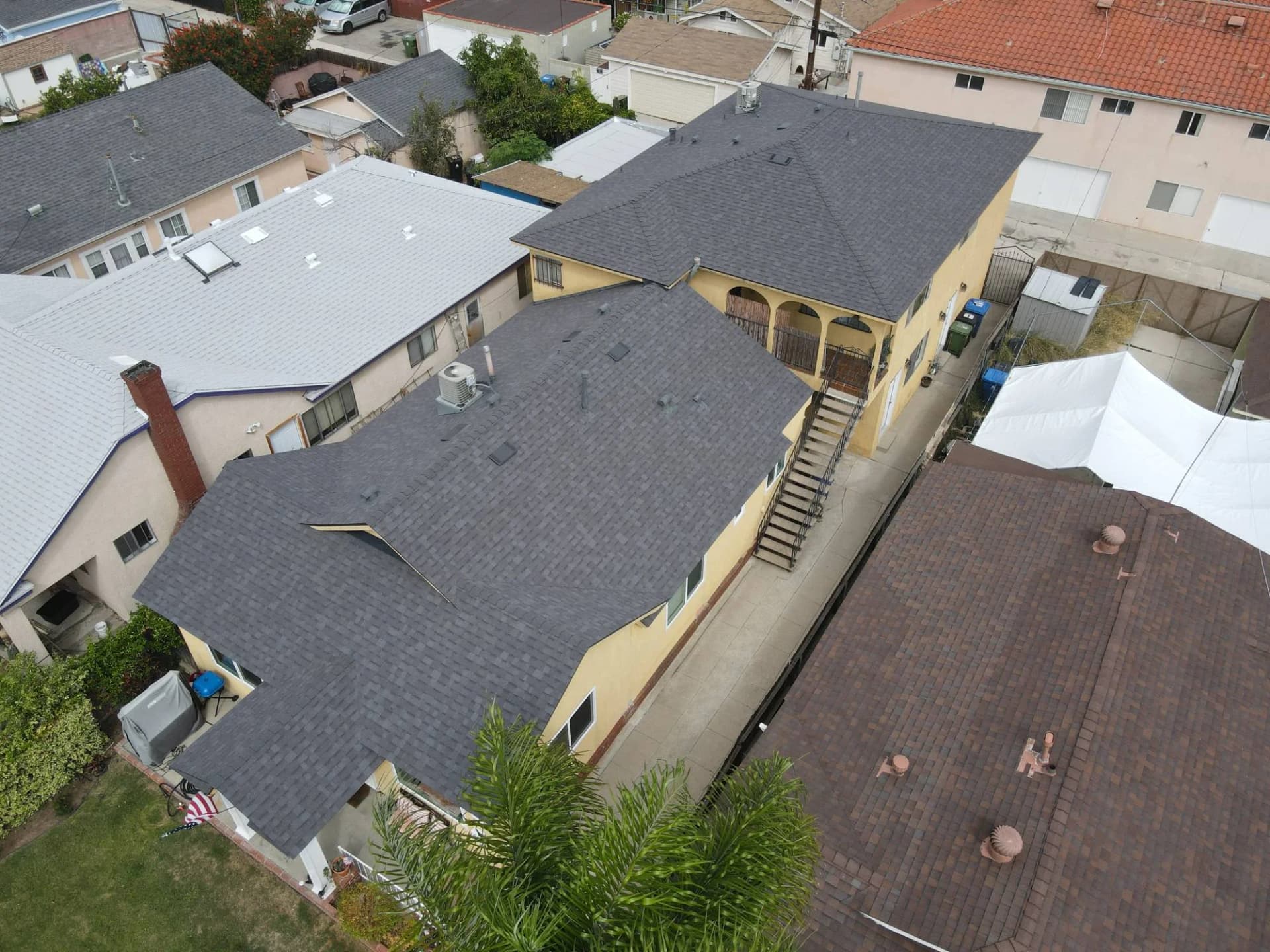 Aerial view of shingle roofs on homes in a Southern California neighborhood