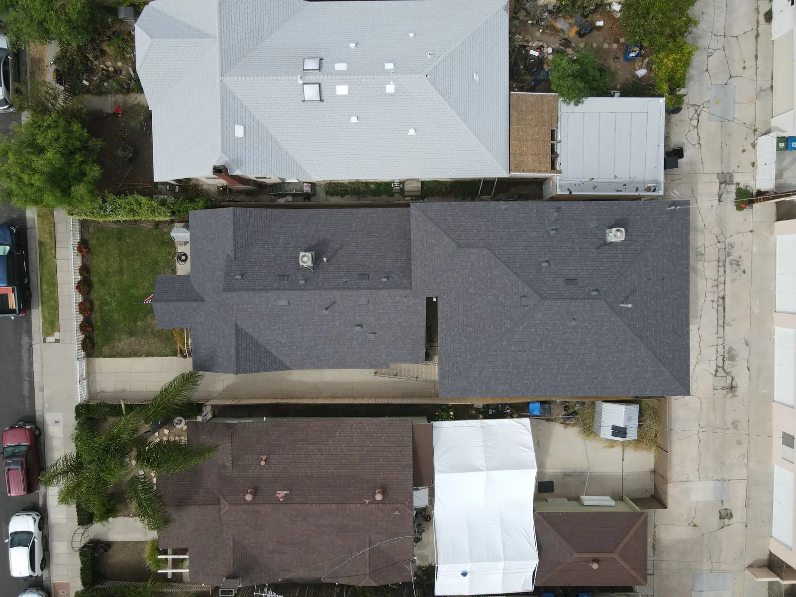 Overhead drone view of the new charcoal shingle roof on a two-story multi-family building in San Pedro