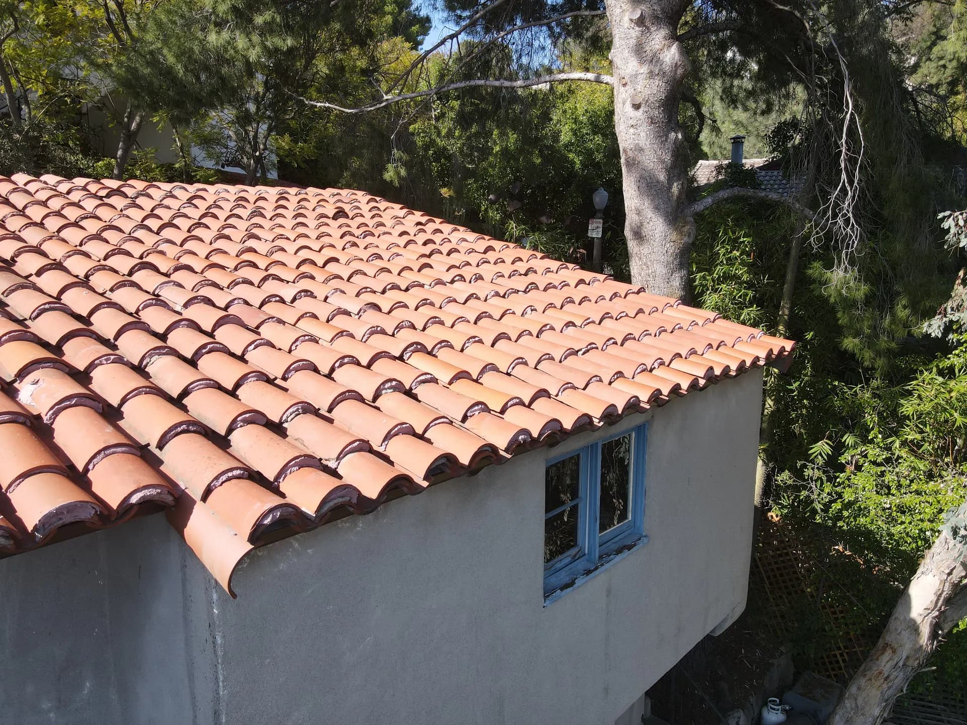 Finished clay barrel tile roof on a Southern California home, viewed from above